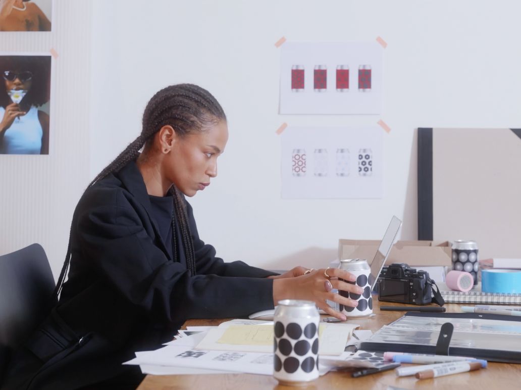 Brand marketer working at a desk